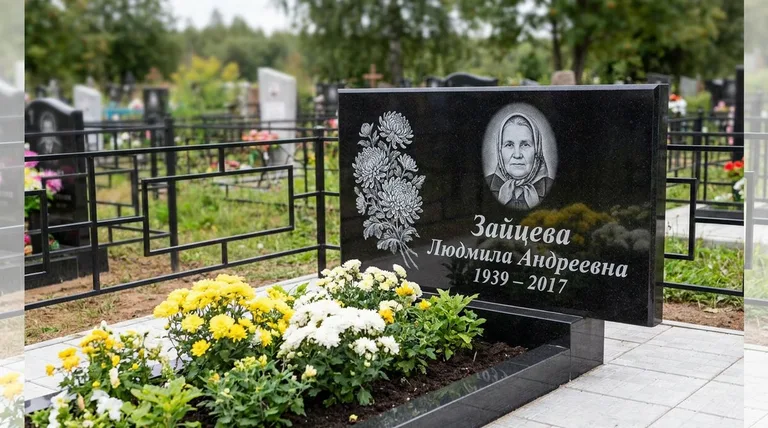Памятник с гравировкой хризантем — выполненная работа «Зайцева» в Новосибирске