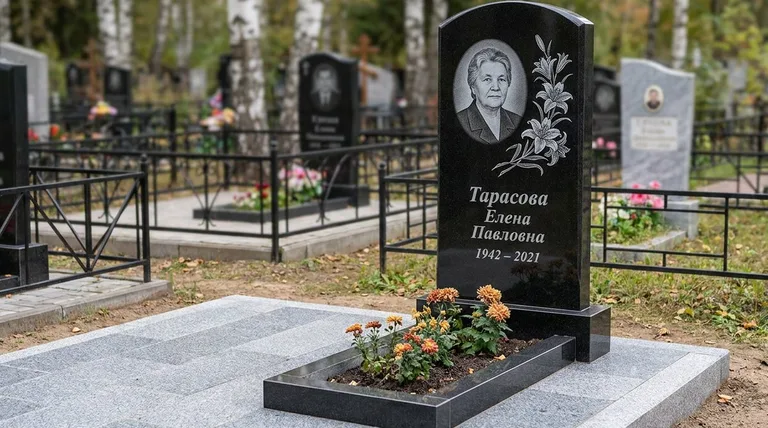 Памятник с гравировкой лилий — выполненная работа «Тарасова» в Новосибирске