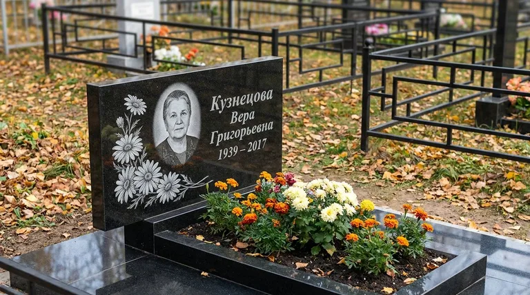 Памятник с гравировкой ромашек — выполненная работа «Кузнецова» в Новосибирске