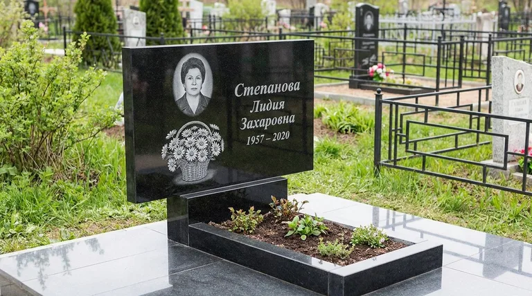 Памятник с гравировкой ромашек — выполненная работа «Степанова» в Новосибирске