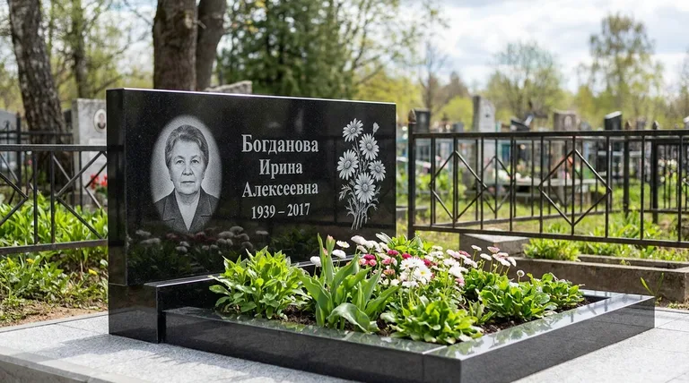 Памятник с гравировкой ромашек — выполненная работа «Богданова» в Новосибирске