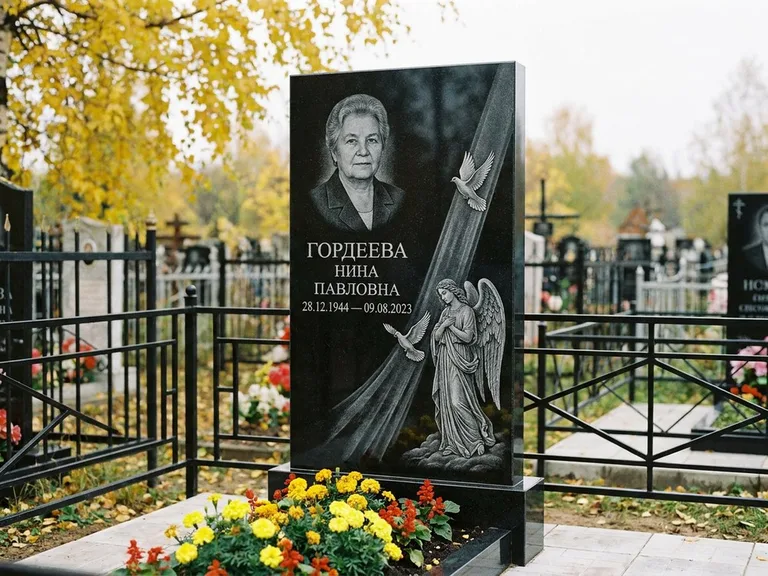 Памятник с гравировкой ангела — гравировка ангела с голубем по диагонали стелы, работа «Гордеева» в Новосибирске