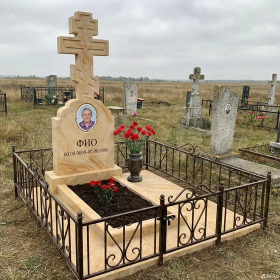 Известняковый памятник с крестом
